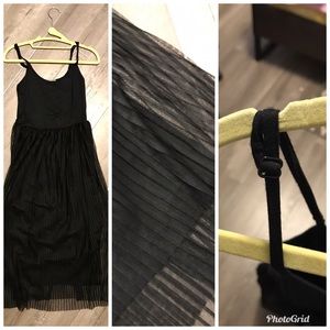 Black sleeveless maxi dress with lace veil